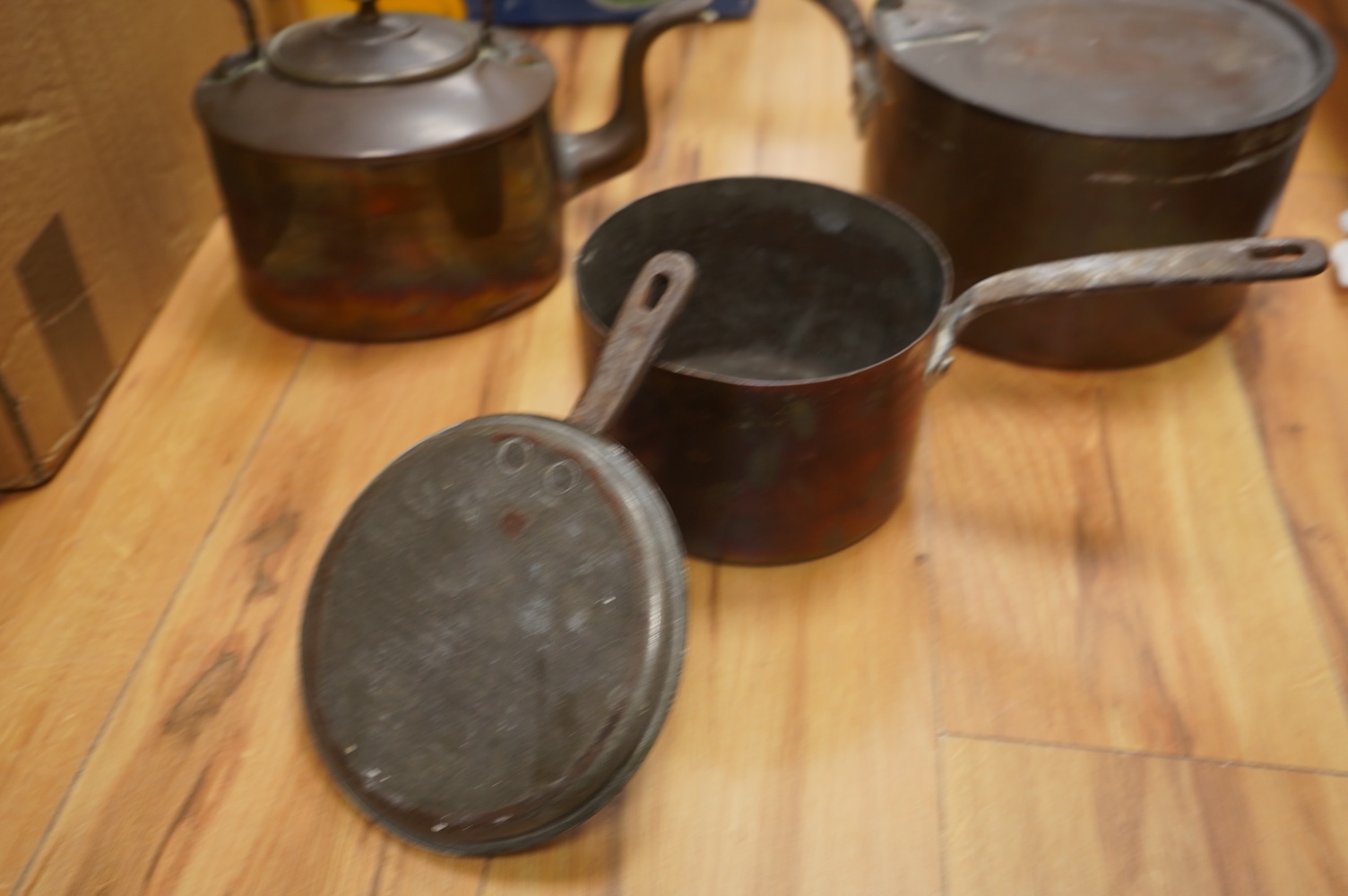 Two Benham & Froud copper saucepans and a copper kettle, largest 43cm in length